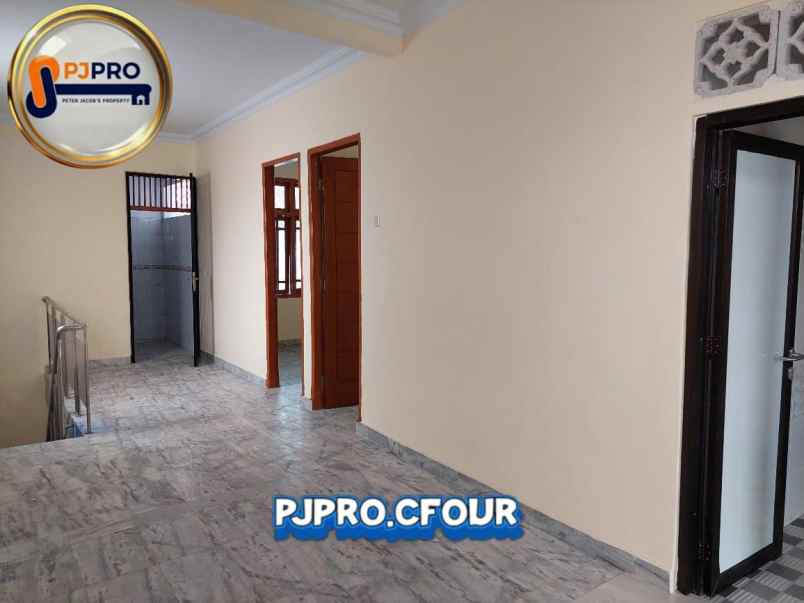 dijual rumah taman harapan baru