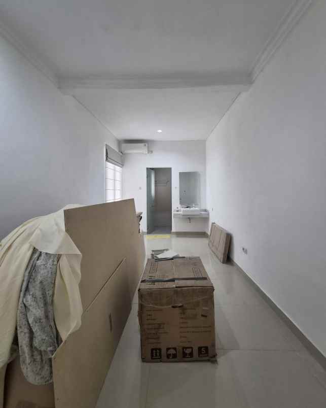 dijual rumah wiguna tengah