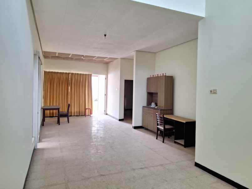 rumah lama minimalis kertajaya dharmahusada surabaya