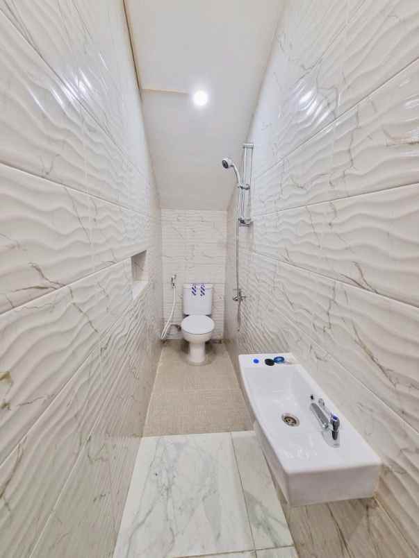rumah mulyosari tengah new minimalis