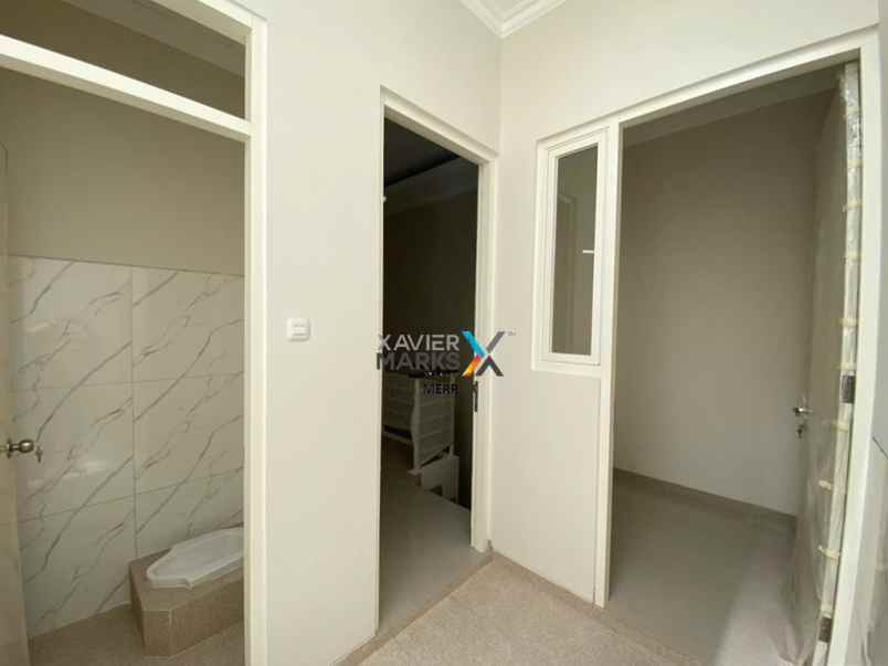 rumah on progress babatan pantai jalan utama komplek