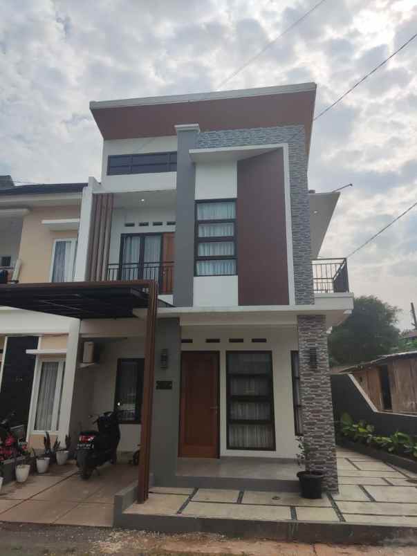 rumah pinggir jalan raya siap huni di sawangan depok