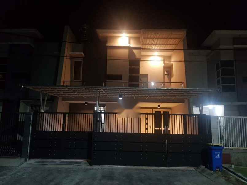 dijual rumah bagus semi furnish melon pakuwon city