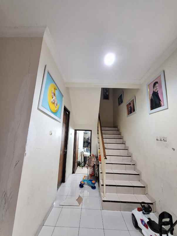 dijual rumah cluster aralia harapan