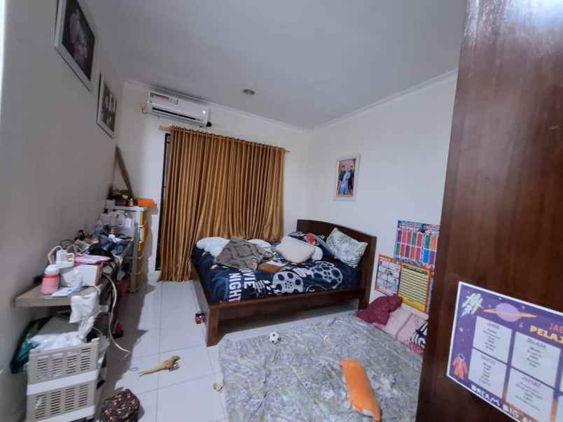 dijual rumah cluster aralia harapan