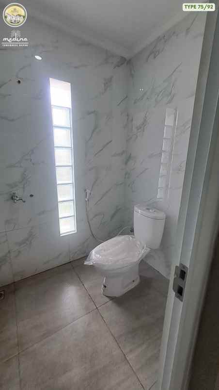 dijual rumah cluster medina townhouse