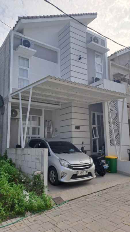 dijual rumah cluster medina townhouse