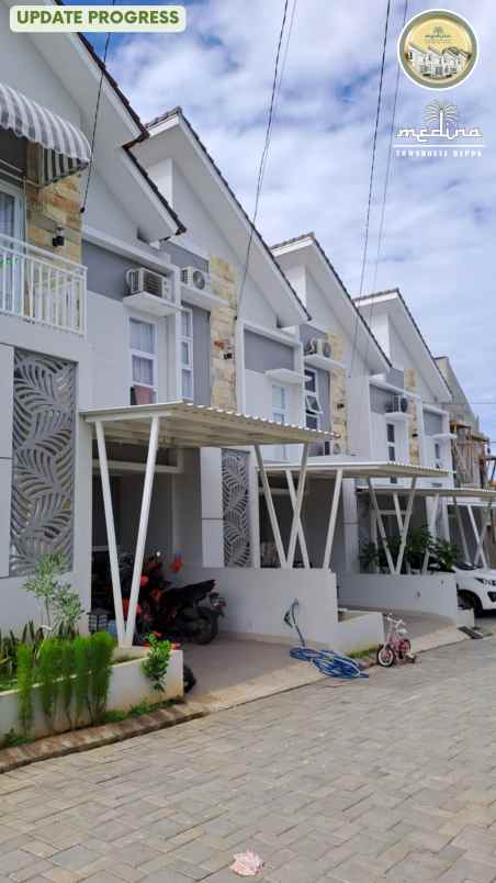 dijual rumah cluster medina townhouse