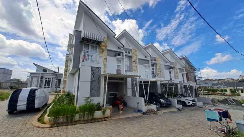dijual rumah cluster medina townhouse