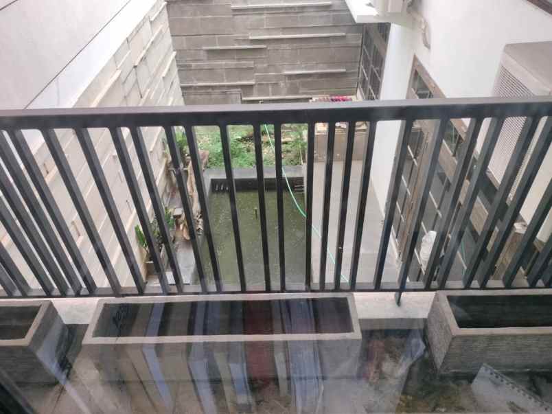 dijual rumah dharmahusada indah barat