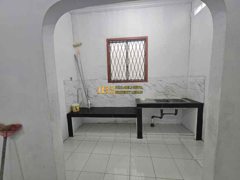 dijual rumah jalan metal raya