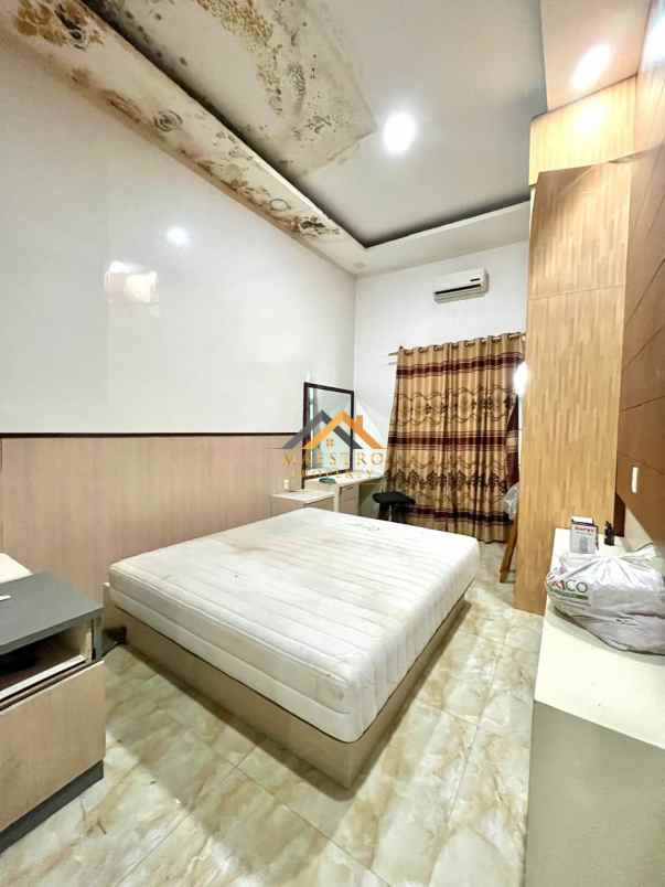 dijual rumah komplek graha metropolitan