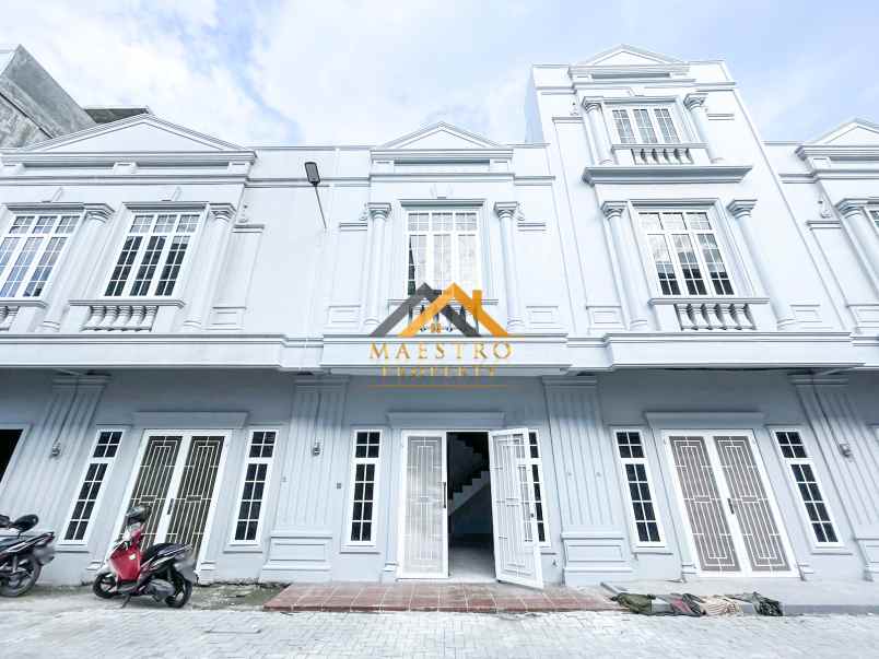 dijual rumah komplek mados royal suite