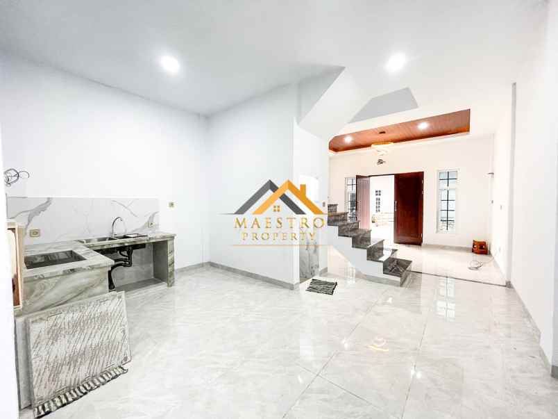 dijual rumah komplek mados royal suite