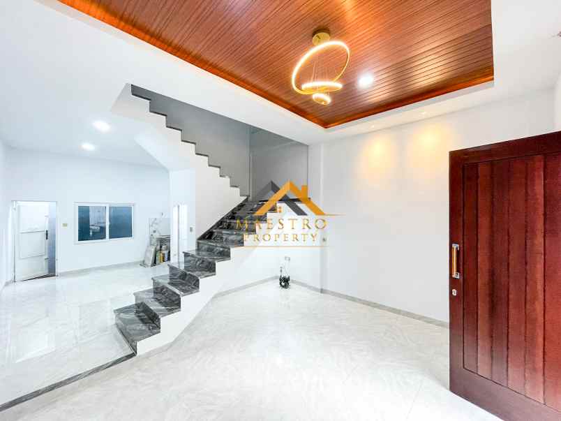 dijual rumah komplek mados royal suite