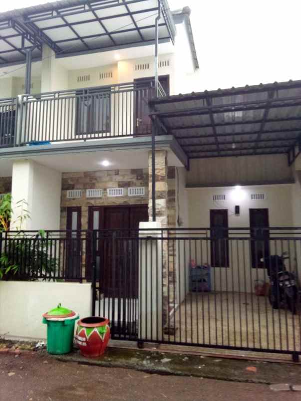 dijual rumah perum purna karya jaya