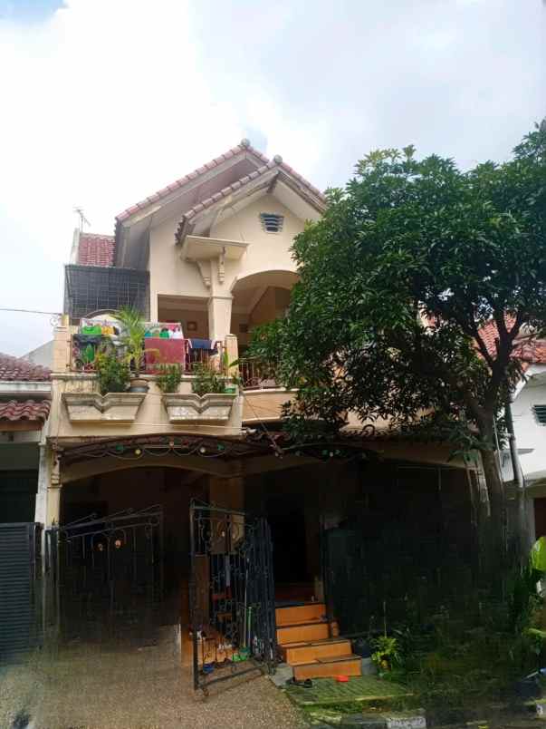 dijual rumah pesona khayangan margonda