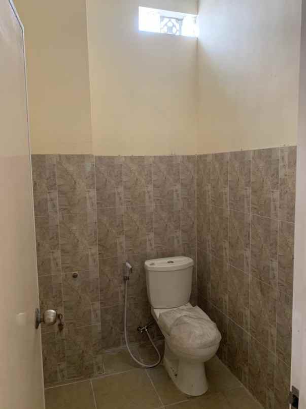 dijual rumah raya kertajaya