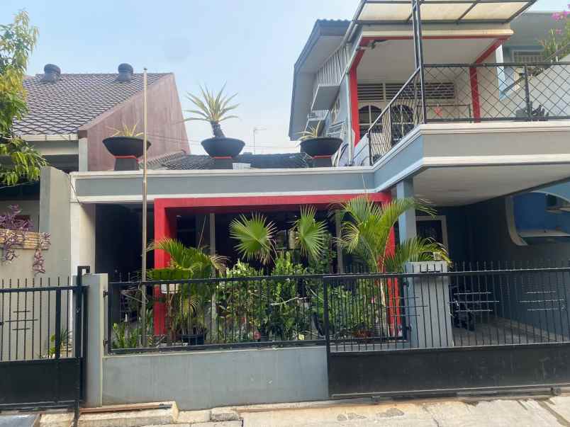 dijual rumah taman buaran indah
