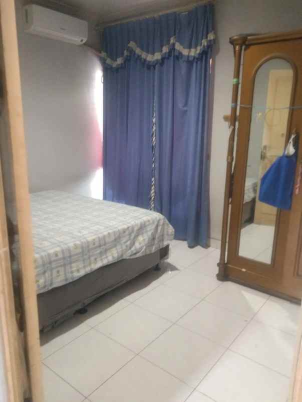 dijual rumah taman modern