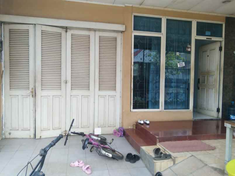 dijual rumah taman modern