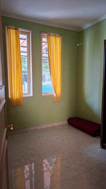 disewakan rumah cluster taman puspa
