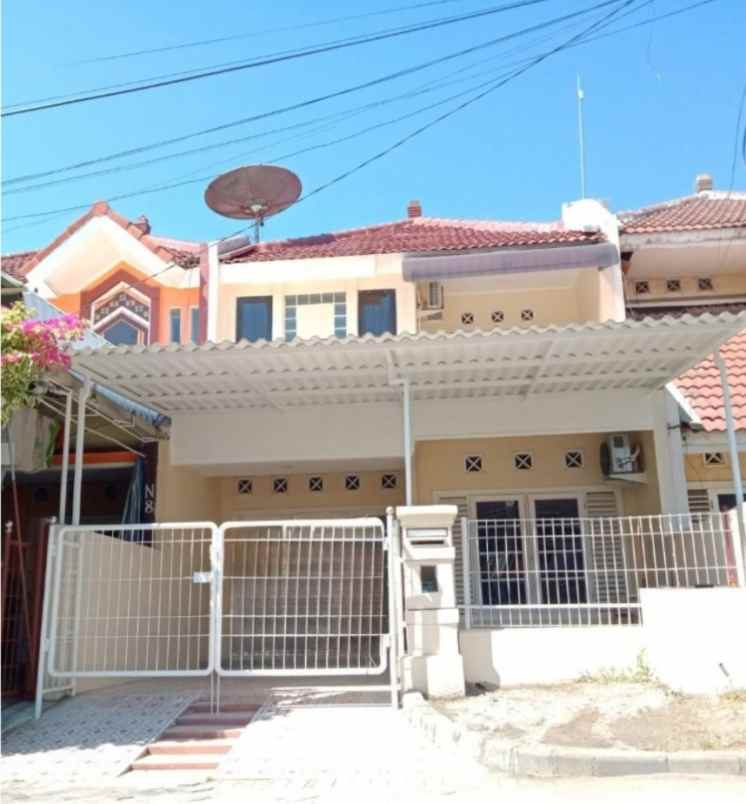 disewakan rumah pantai mentari