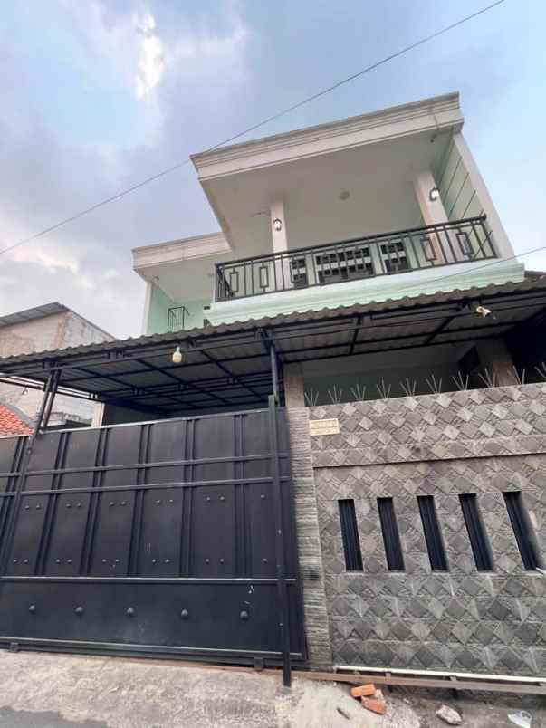 rumah 2 lantai bangunan baru di tapos cimanggis depok