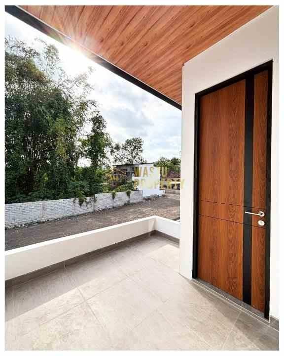 rumah 2 lantai dalam cluster one gate di jogja utara