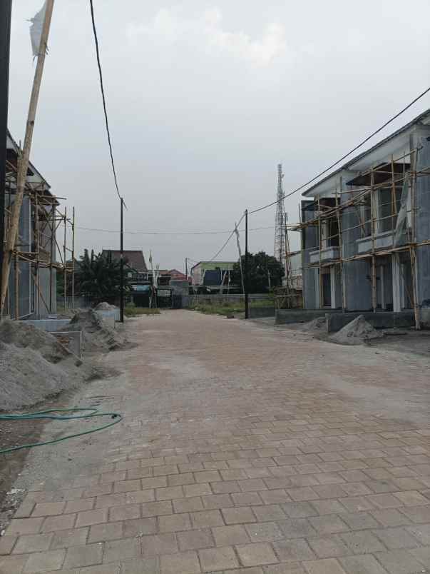 rumah 2 lantai dengan akses tol tanah baru