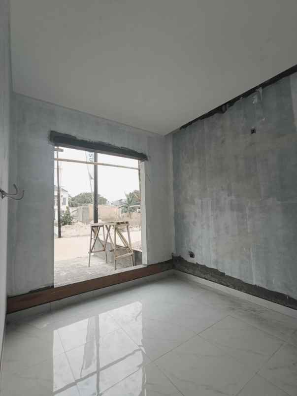 rumah 2 lantai dengan akses tol tanah baru