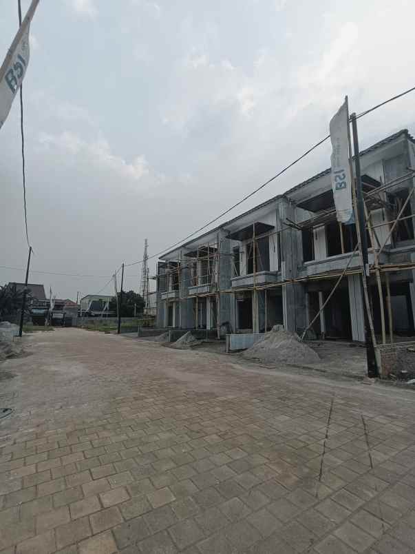 rumah 2 lantai dengan akses tol tanah baru