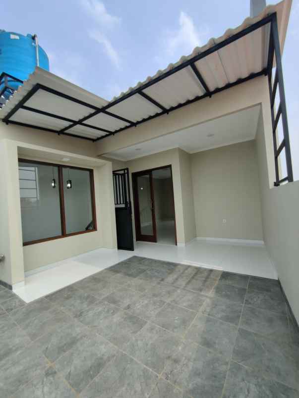 rumah baru dengan rooftop di pondok kelapa jaktim