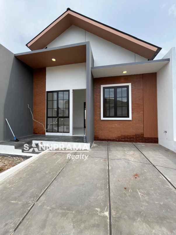 rumah cluster dekat gerbang tol sawangan