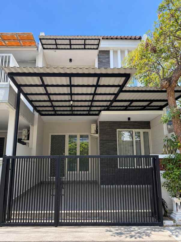 rumah di pakuwon city cluster taman mutiara