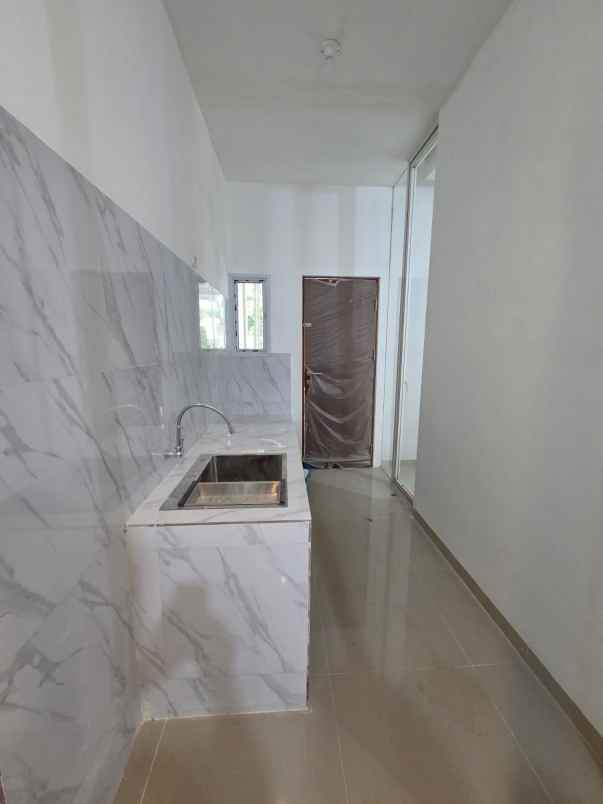 rumah pakuwon indah mansion pf surabaya