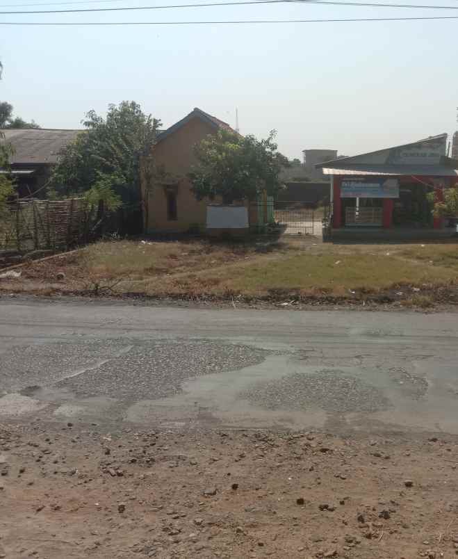 tanah rata dan padat strategis pinggir jln raya