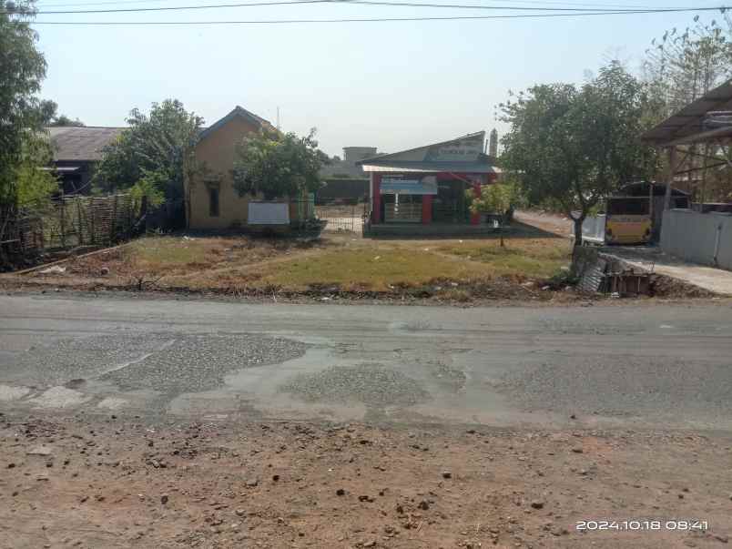 tanah rata dan padat strategis pinggir jln raya