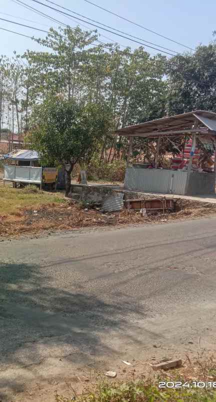 tanah rata dan padat strategis pinggir jln raya