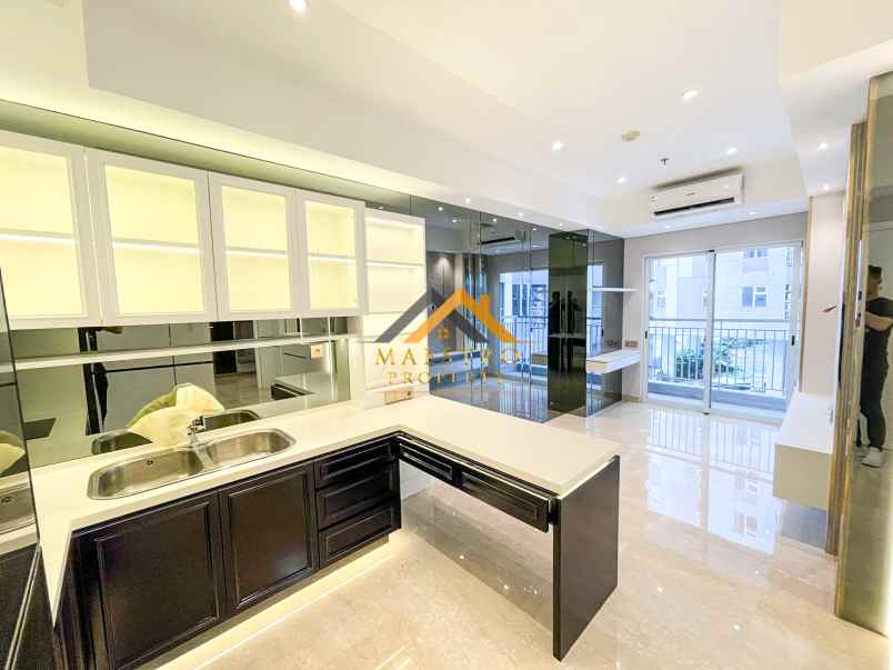 dijual apartemen podomoro city deli tower