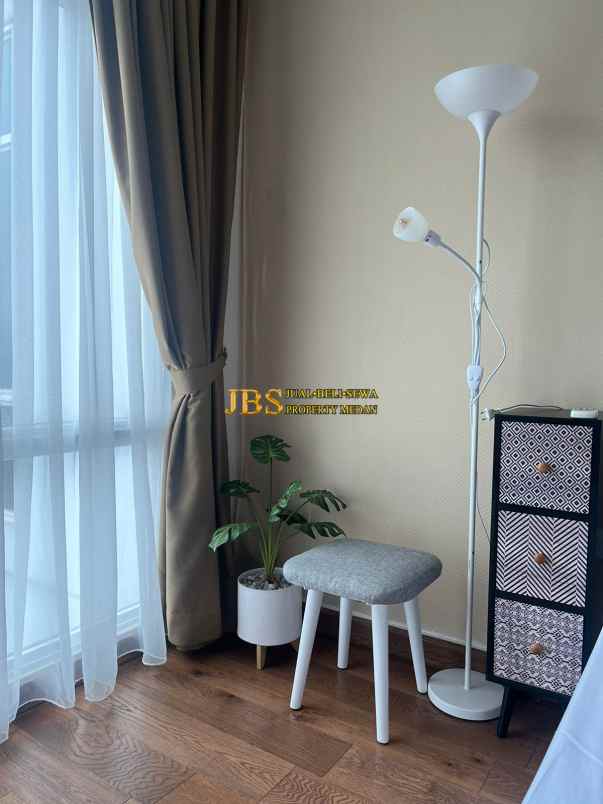 dijual apartemen the reiz condo