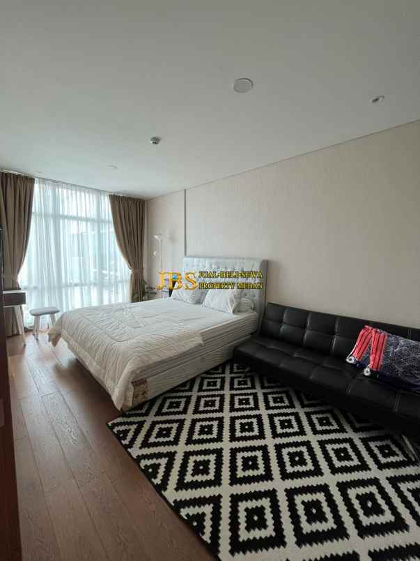 dijual apartemen the reiz condo