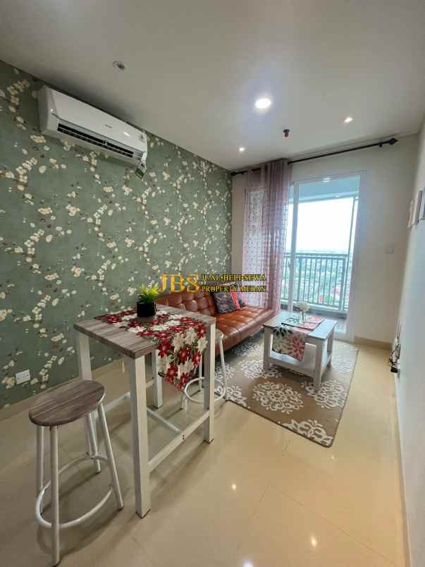 dijual cepat apartemen the reiz condo