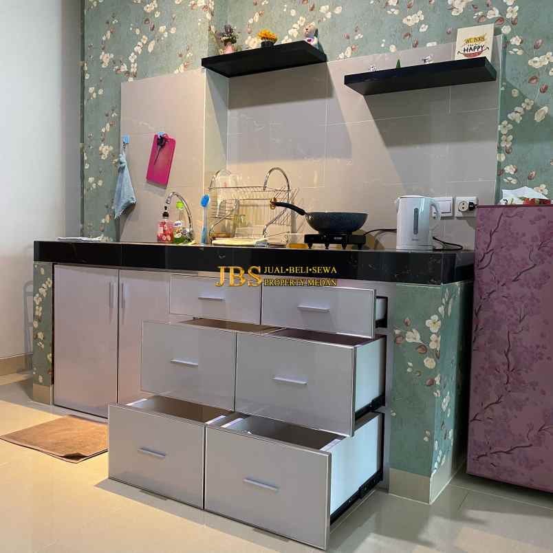 dijual cepat apartemen the reiz condo