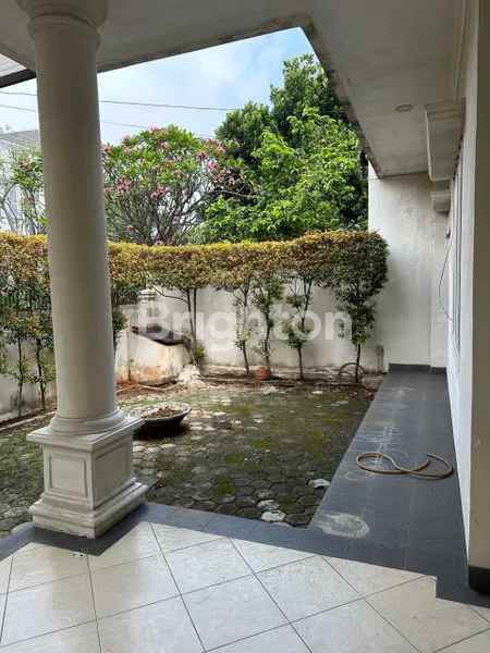 dijual rumah bukit hijau pondok indah