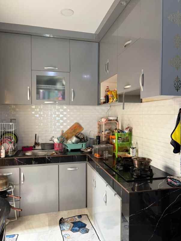 dijual rumah cluster aralia kota