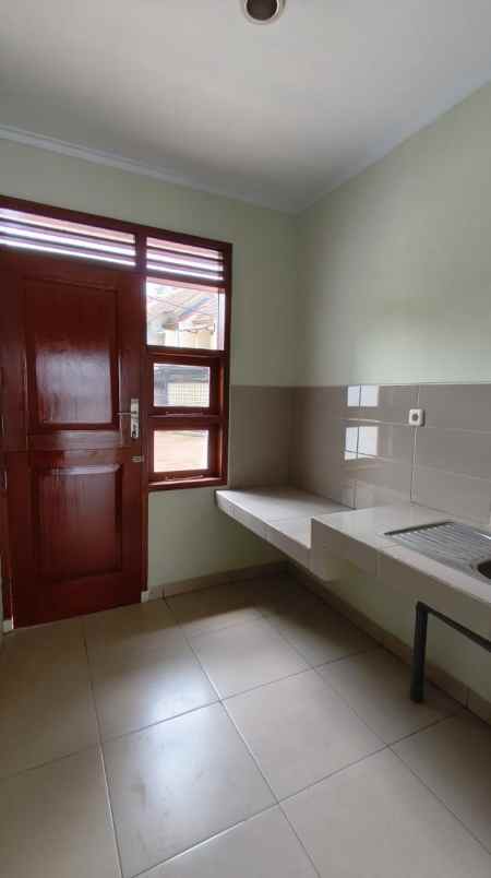 dijual rumah cluster madany regecy