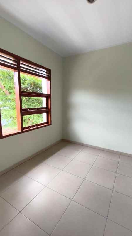 dijual rumah cluster madany regecy