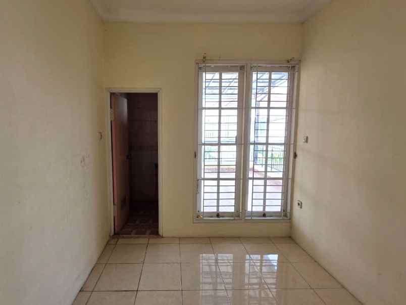 dijual rumah cluster taman puspa kota