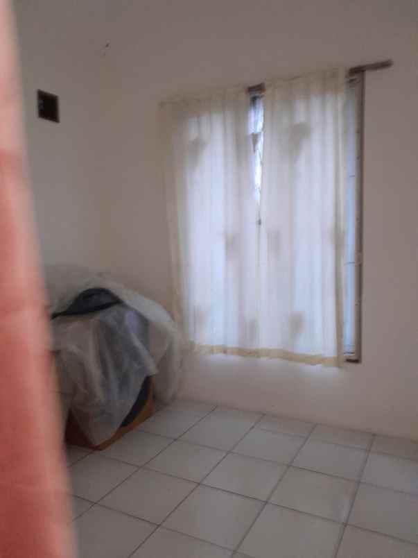 dijual rumah komplek sariwangi